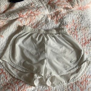 White Nike shorts